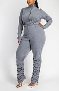 Zip front jumpsuit with ruched bottom